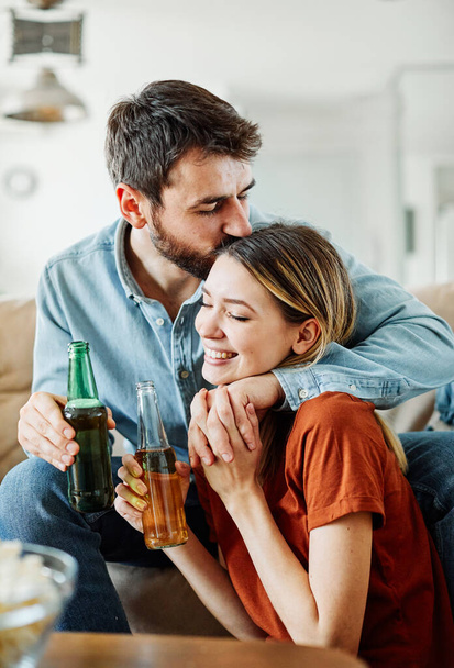 love young couple kissing party drinkbeer happy having fun - Photo, Image