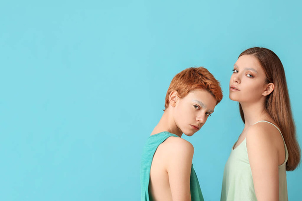 Teenagers with dyed eyebrows on color background - Photo, Image