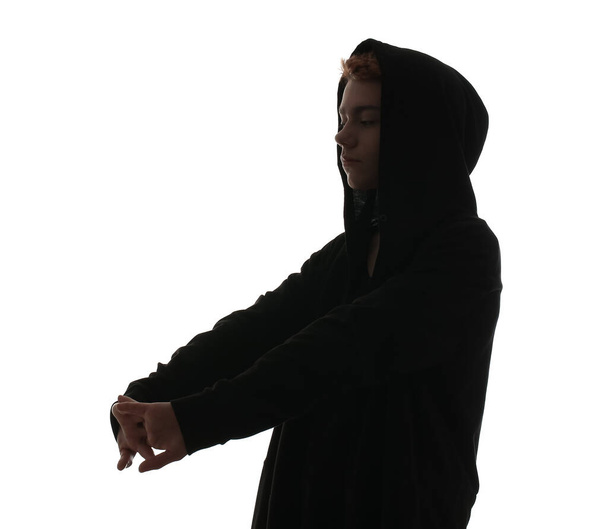 Silhouette of hacker on white background - Photo, image