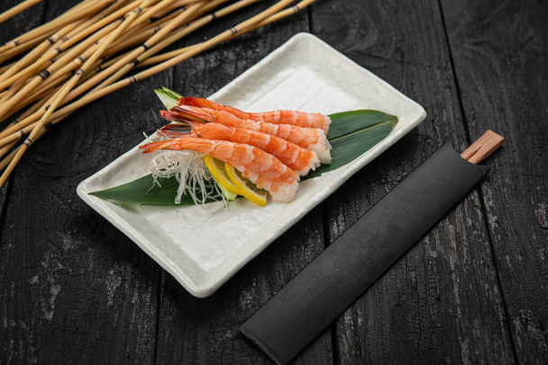 Assorted sashimi on a dark table - Foto, Imagem