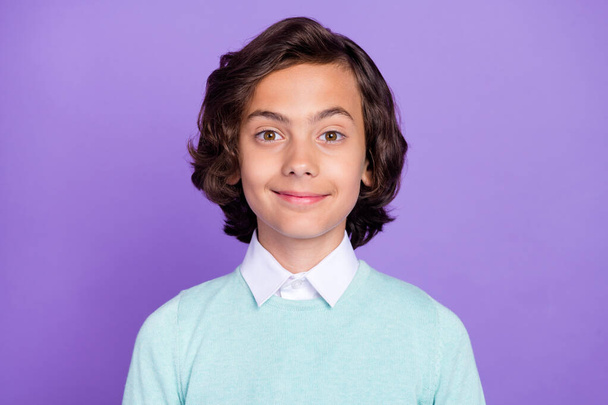Photo of pretty charming schoolboy wear teal pullover smiling isolated purple color background - 写真・画像