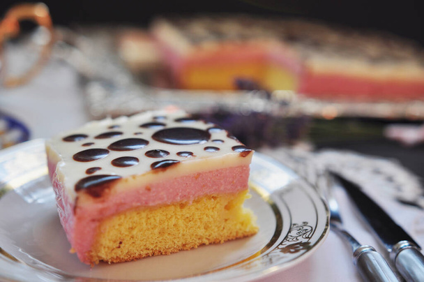 Sweet breakfast, Piece of tasty raspberry cake on a plate close up.  - Photo, Image