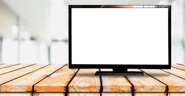 Blank Screen Lcd Tv auf Holzplatte mit verschwommenem Hintergrund - Foto, Bild