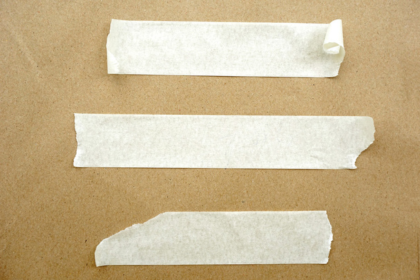 Brown paper with white tape for background - Photo, Image