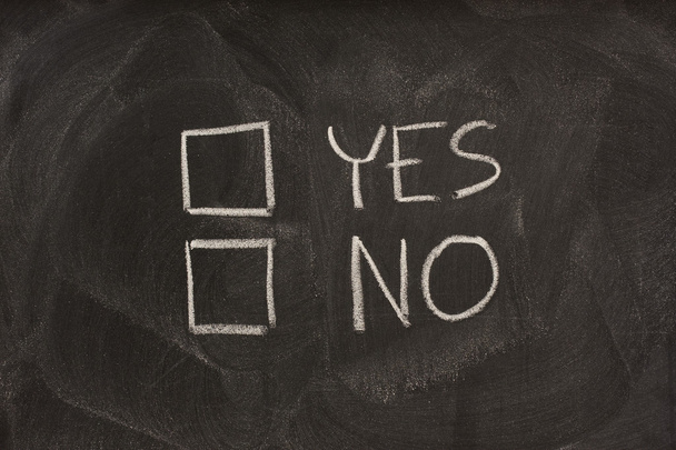 Yes and no check boxes sketched with white chalk on blackboard with eraser smudges - Φωτογραφία, εικόνα
