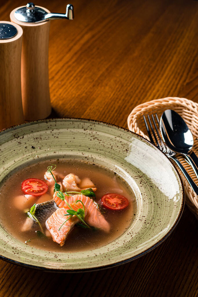 Trout fish soup in a clay bowl on the table. - Photo, Image