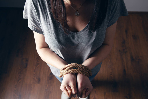 young woman's hands are tied - Foto, Imagen