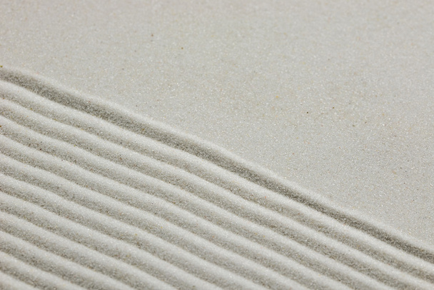 Zen Hintergrund aus geharktem Sand - Foto, Bild