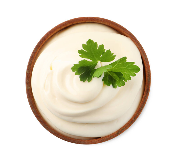 Bowl with delicious mayonnaise and parsley isolated on white, top view - Fotoğraf, Görsel