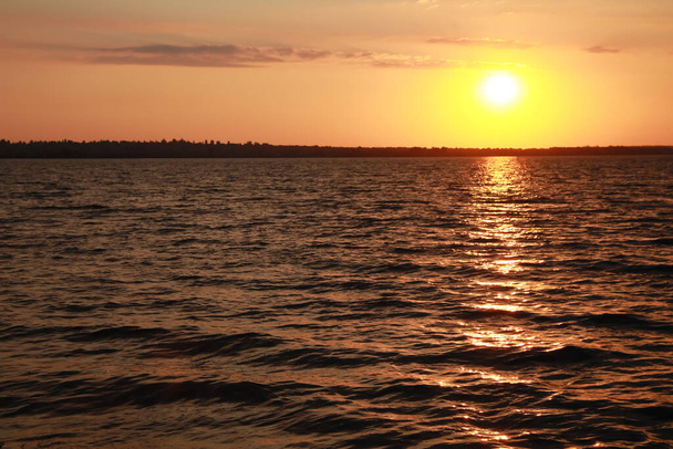 Picturesque view of beautiful sunset on riverside - Fotografie, Obrázek