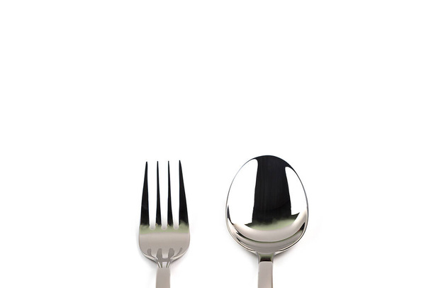 fourchette et cuillère isolées sur fond blanc - Photo, image