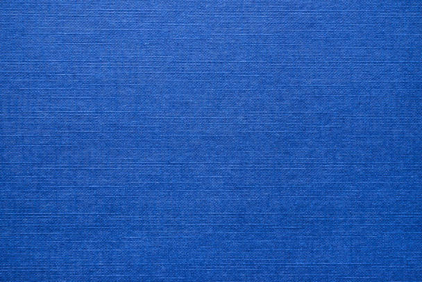 A bright blue textile background - Foto, Bild