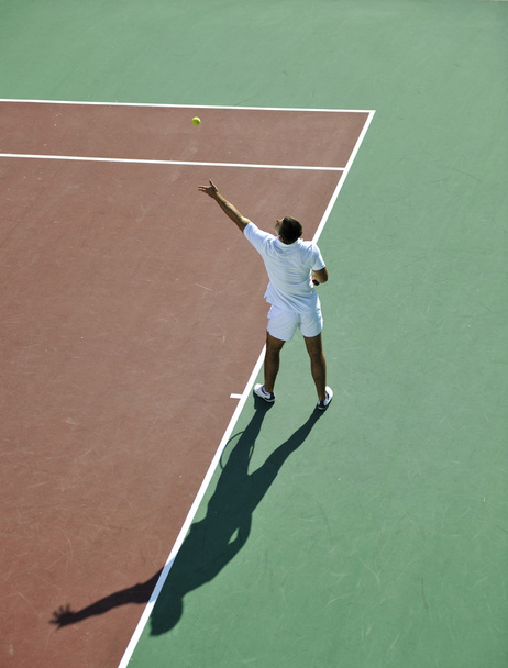 Young man play tennis - Foto, afbeelding