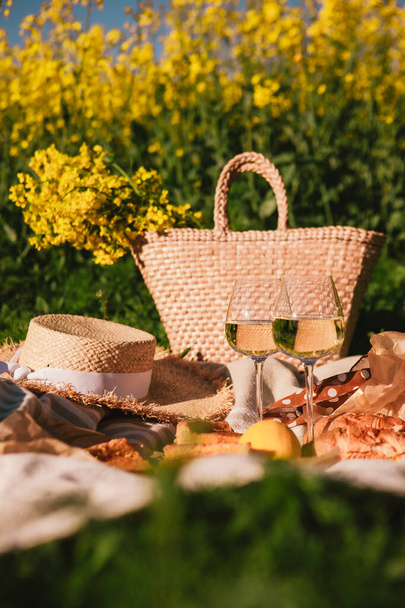 picnic concept glasses of wine bun outdoors on blanket summertime - Zdjęcie, obraz