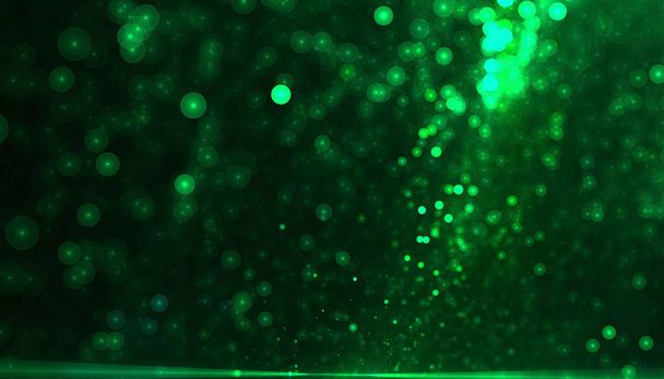 Green particle dust background with bokeh effect - Photo, Image