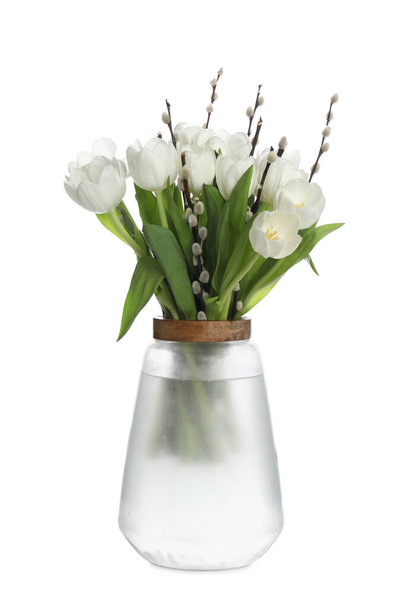 Beautiful bouquet of willow branches and tulips in vase isolated on white - Φωτογραφία, εικόνα