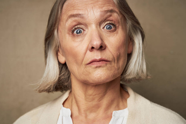 elderly woman in robe face closeup posing isolated background - Photo, Image