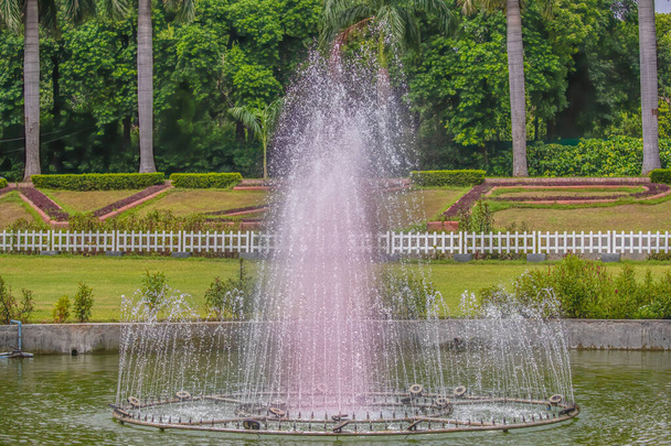 A beautiful fountain in a garden - Photo, Image