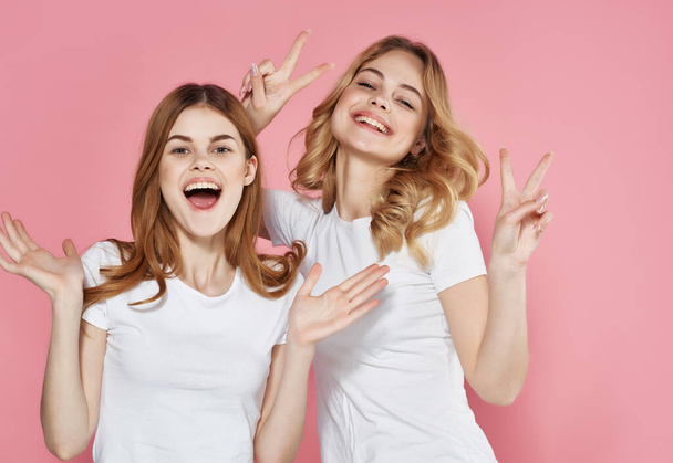 funny girlfriends in his t-shirts hand gestures emotions modern style - Photo, Image