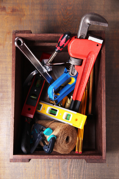 Wooden box with different tools - Valokuva, kuva