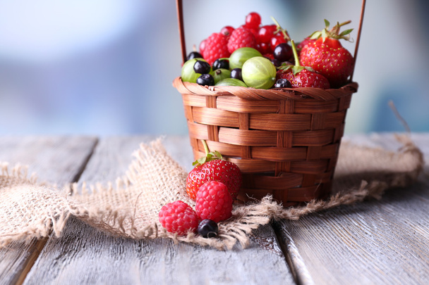 Forest berries in wicker basket - Photo, image