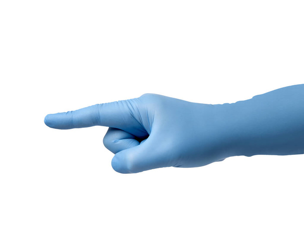 gant en latex main pointant doigt protection virus coronvirus corona maladie épidémie hygiène de santé médicale - Photo, image