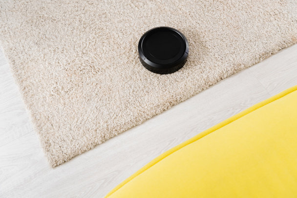 High angle view of robotic vacuum cleaner at home  - Fotoğraf, Görsel