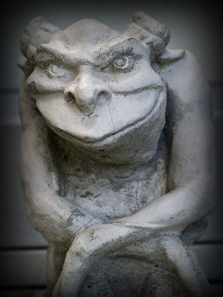 Gargoyle Statue Emphasis on Face and Eyes with a Dark Border - Photo, Image