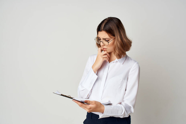 cheerful business woman in white shirt documents copy space office - Photo, Image