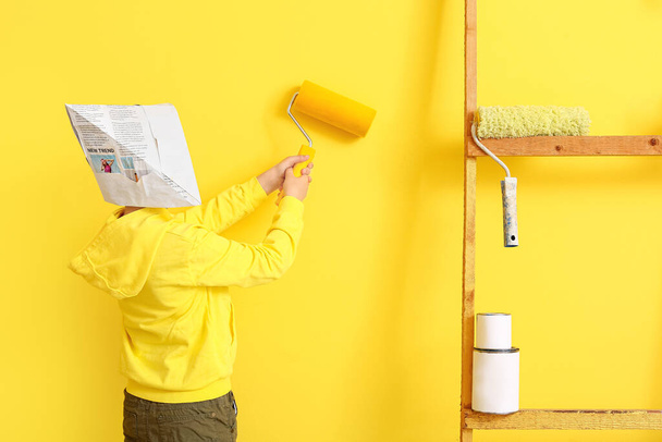 Little boy painting wall in room - Photo, Image