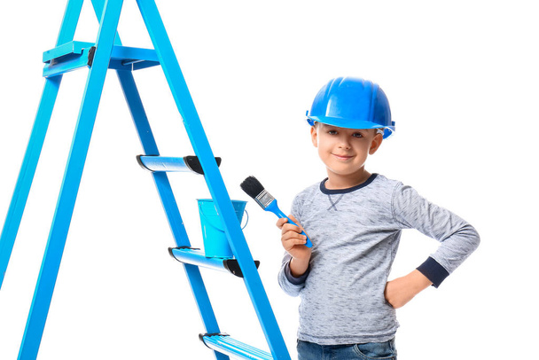 Little painter with brush and ladder on white background - Photo, Image
