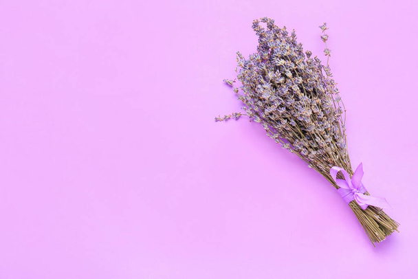 Bouquet of lavender flowers on color background - Fotó, kép