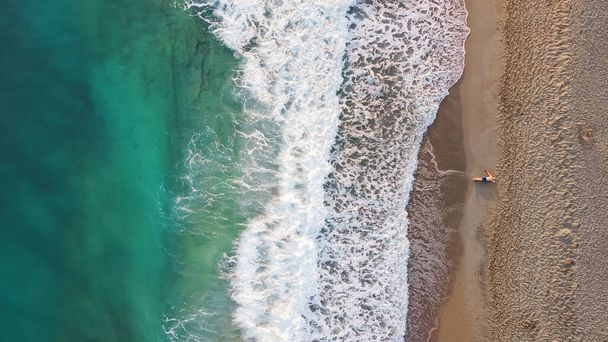 Aerial from drone of an stunning beautiful sea landscape beach with turquoise water at sunrise. Free copy space. - Zdjęcie, obraz
