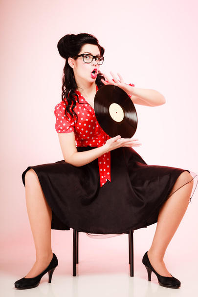 Pinup girl with vinyl record - Fotó, kép