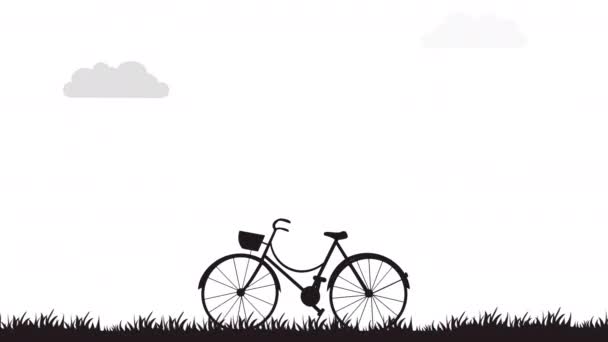 Silhouet van de fiets op het veld met gras beweging animatie. - Video