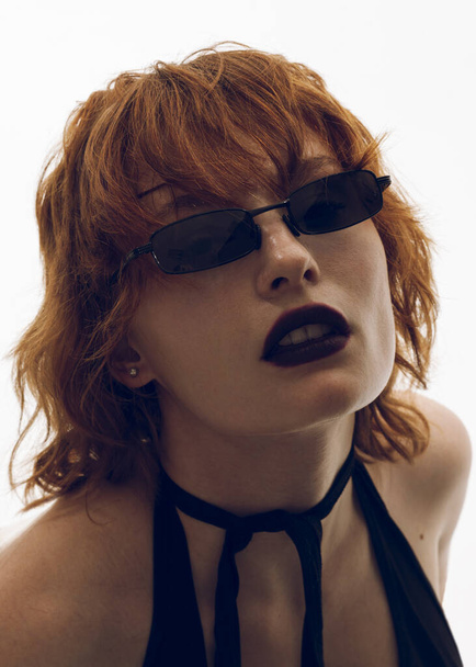 beautiful girl with fashionable hairstyle in sunglasses and dark lipstick - Φωτογραφία, εικόνα