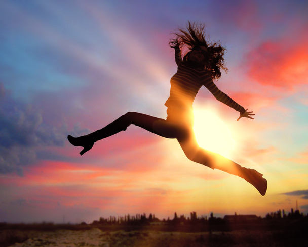 Silhouette of jumping girl - Photo, Image