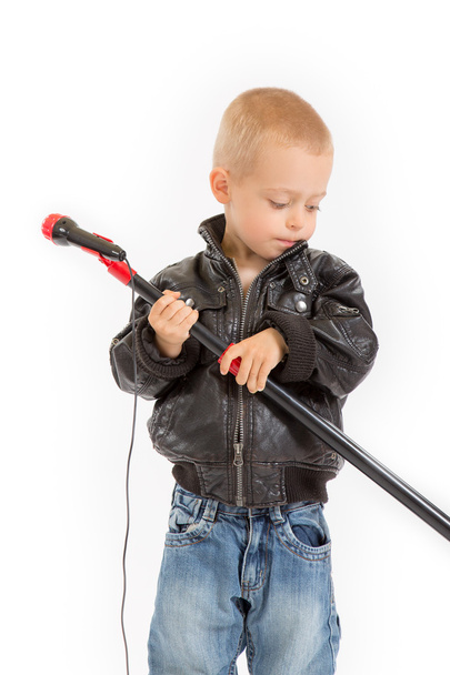 little rocker boy with a microphone stand - Foto, Imagen
