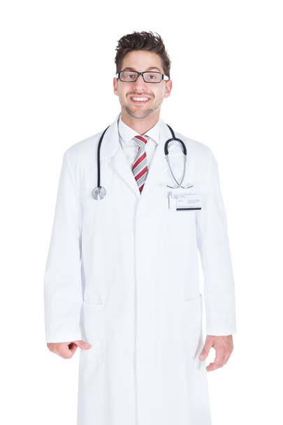 Confident Mid Adult Male Doctor With Stethoscope - Zdjęcie, obraz