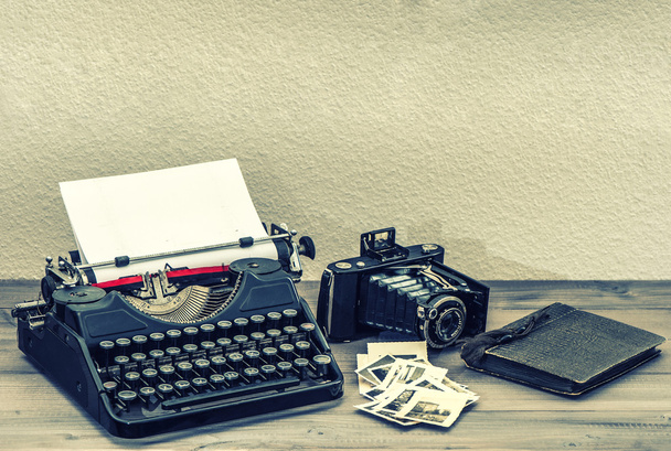 Antique typewriter and vintage photo camera - Photo, Image