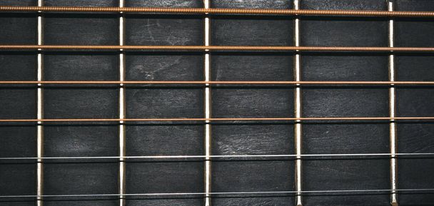 Gitarrensaiten und Griffbrett in Nahaufnahme für Hintergrund - Foto, Bild