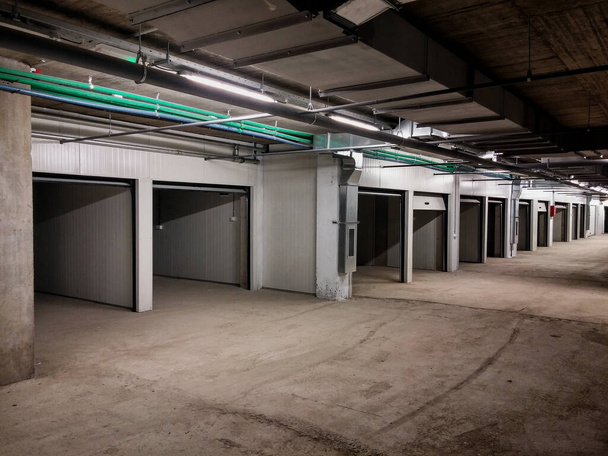 Garage building made of concrete with roller shutter doors - Photo, Image