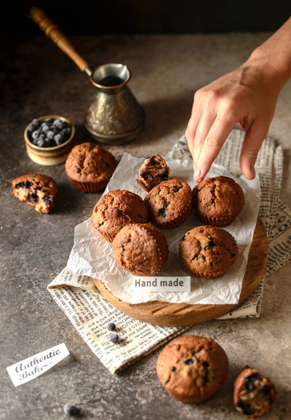 blueberry muffins and coffee on parchment. High quality photo - Photo, Image
