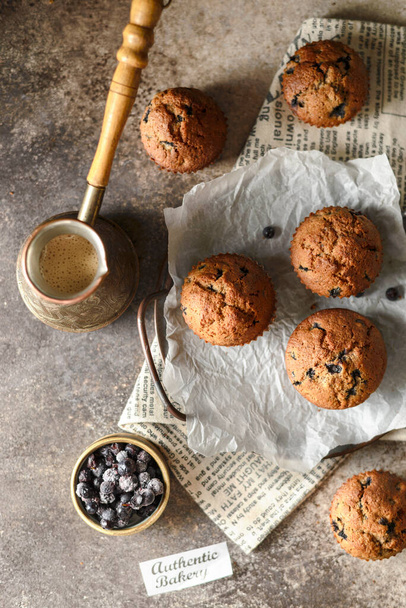blueberry muffins and coffee on parchment. High quality photo - Foto, imagen