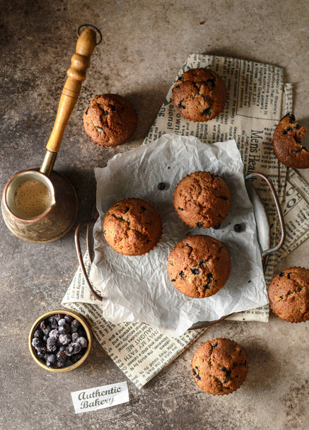 blueberry muffins and coffee on parchment. High quality photo - Foto, immagini