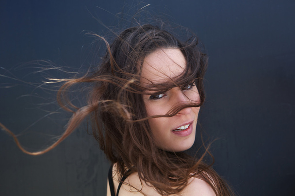 Female fashion model with hair blowing - Φωτογραφία, εικόνα