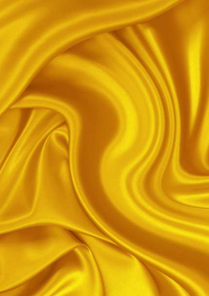 Smooth elegant golden satin can use as background - Photo, Image