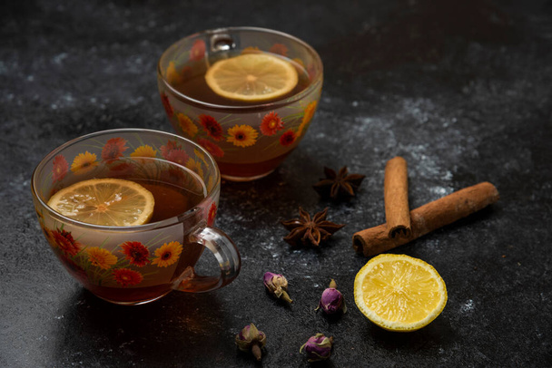 A cup of tea with flavour spices and herbs. High quality photo - Photo, Image