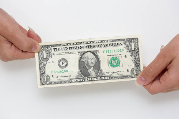 Billete de 1 dólar de los Estados Unidos con monedas y bandera en la parte inferior. - Foto, Imagen
