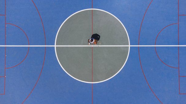 An aerial view of the central part of the  blue basketball playground - Foto, Bild